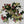 funeral flower wreath with white lilies and red flowers with stand